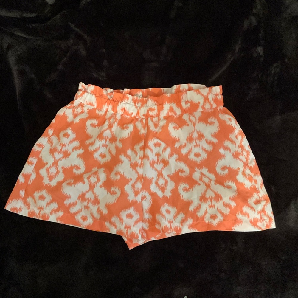 orange and white shorts
